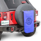 a red jeep with a blue sac hanging in the back