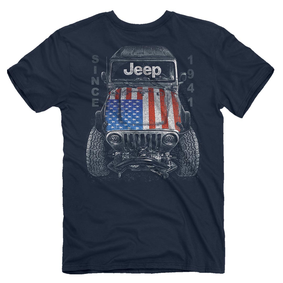 a dark navy t-shirt featuring a jeep seen from above with a usa flag on its hood and “since 1941” around it