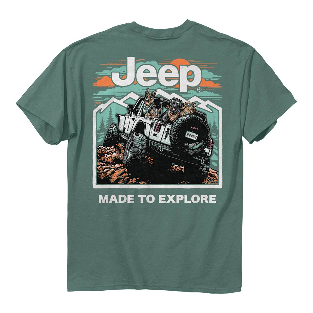 a teal green shirt with the jeep logo, an illustration of a jeep full of dogs off-roading, and the text “made to explore”