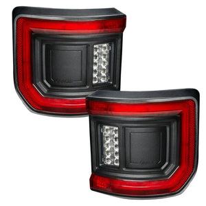 a pair of tail lights with Oracle logos on them
