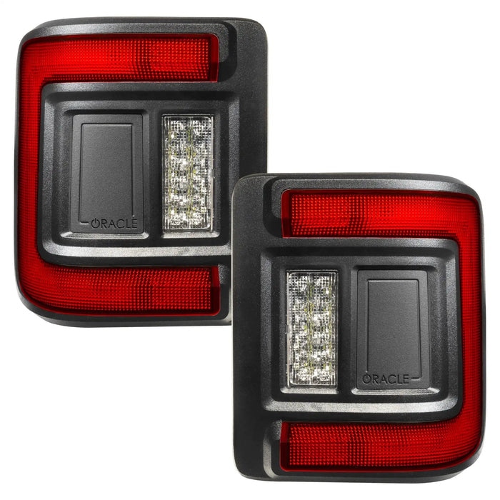 a pair of tail lights with Oracle logos on them