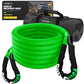 a green coiled recovery rope sits in front of it’s packaging and carrying case
