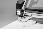 a pod light mounted on a white vehicle
