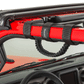Close-up red jeep vehicle with black grab handle installed