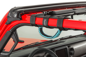 Close-up red jeep vehicle with teal blue grab handle installed
