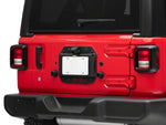 the rear of a red jeep with the spare tire removed