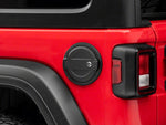 a close cropped image of a jeep wrangler with a fuel door cover installed